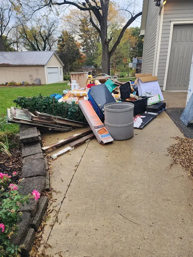 Dumpster being loaded with debris for Demolition Dumpster Rental in Pottsville